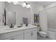 Bathroom featuring double vanity, shower and tub with tile surround and great lighting at 3215 Jones Lake Rd, Fuquay Varina, NC 27526