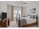 Inviting bedroom with warm lighting, wooden furniture, and comfortable furnishings at 3215 Jones Lake Rd, Fuquay Varina, NC 27526