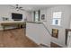 Bonus room with a billiards table, a tv, and hardwood floors at 3215 Jones Lake Rd, Fuquay Varina, NC 27526