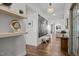 Bright entryway featuring hardwood floors, stylish decor, and seamless transition to living spaces at 3215 Jones Lake Rd, Fuquay Varina, NC 27526