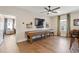 Well-lit game room with a shuffleboard table and a bar area at 3215 Jones Lake Rd, Fuquay Varina, NC 27526