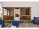 Enclosed screened porch with an access door is conveniently located off a beautiful stone patio at 3215 Jones Lake Rd, Fuquay Varina, NC 27526