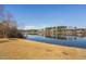 Peaceful lakefront property with blue skies at 3215 Jones Lake Rd, Fuquay Varina, NC 27526