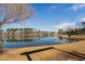 Lake view with trees and blue sky at 3215 Jones Lake Rd, Fuquay Varina, NC 27526