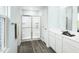 Modern bathroom showcasing a glass-enclosed shower, sleek vanity with a white countertop, and contemporary fixtures at 351 Tormore Dr, Sanford, NC 27330