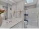 Well-lit bathroom with a shower-tub combo and ample vanity space at 360 Linden Close, Pittsboro, NC 27312