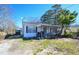 Exterior view of single-story home with front porch at 407 Iris Bryant Rd, Dunn, NC 28334
