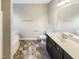 Bathroom with large vanity, framed mirror, and shower-tub combo at 480 Stonewall Dr, Mebane, NC 27302