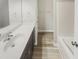 Bathroom with a sleek vanity, modern fixtures, and a shower-tub combination for relaxation at 480 Stonewall Dr, Mebane, NC 27302