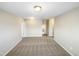 Neutral walls and carpeting define this expansive bedroom with easy access to hallways and other living spaces at 480 Stonewall Dr, Mebane, NC 27302