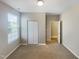 Neutral bedroom with carpet, a window, and a closet; versatile for creating a personalized retreat at 480 Stonewall Dr, Mebane, NC 27302