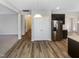Kitchen area with adjacent stainless steel refrigerator at 480 Stonewall Dr, Mebane, NC 27302