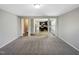 Open-concept living room with a seamless flow to the kitchen and dining area, perfect for modern living at 480 Stonewall Dr, Mebane, NC 27302