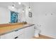 Modern bathroom with sleek vanity, and stylish blue tile shower at 521 N Mangum St # 12, Durham, NC 27701