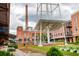 An exterior of the Lucky Strike building, with a view of the water and a brick structure, creating a relaxed atmosphere at 521 N Mangum St # 12, Durham, NC 27701
