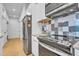 Modern kitchen featuring stainless steel appliances and a checkered backsplash at 521 N Mangum St # 12, Durham, NC 27701