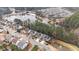 Overhead view of a neighborhood featuring a large lake with a beach and fountain at 5213 Orabelle Ct, Raleigh, NC 27606