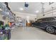 Spacious garage featuring ample storage shelving and a parked SUV, maximizing organization and convenience at 5213 Orabelle Ct, Raleigh, NC 27606
