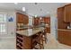 Spacious kitchen featuring a large island, stainless steel appliances, and ample cabinetry at 5213 Orabelle Ct, Raleigh, NC 27606