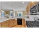 Well-equipped kitchen featuring stainless steel appliances, ample cabinet space, and white countertops at 6013 Kohler Ln, Raleigh, NC 27616