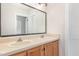 Bright bathroom featuring a double vanity, updated fixtures, and a large mirror at 604 S Chavis St, Franklinton, NC 27525