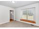 Bright bedroom with a large window and natural light, perfect for relaxation at 604 S Chavis St, Franklinton, NC 27525