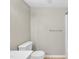 Clean and neutral-toned bathroom with modern toilet and tub/shower combo at 612 Pine Ridge Pl, Raleigh, NC 27609