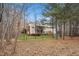 Large backyard with mature trees offers shade and privacy to this home at 7001 Millstone Ridge Ct, Raleigh, NC 27614