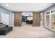 Bonus room with wooden saloon doors leading to media room with theater screen and seating at 7001 Millstone Ridge Ct, Raleigh, NC 27614