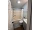 Modern bathroom with black hardware, shower, and vanity for a contemporary aesthetic at 704 Martin Luther King Jr Blvd # D12, Chapel Hill, NC 27514