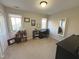 Bedroom featuring abundant natural light, a dedicated desk area, and ample storage at 704 Martin Luther King Jr Blvd # D12, Chapel Hill, NC 27514