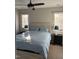 Cozy bedroom with a queen bed, natural light, and contemporary bedside tables at 704 Martin Luther King Jr Blvd # D12, Chapel Hill, NC 27514
