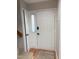 Entryway with a view of the front door and adjacent flight of stairs at 704 Martin Luther King Jr Blvd # D12, Chapel Hill, NC 27514