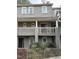 Charming two-story condo features balconies, neutral paint, and well-maintained landscaping at 704 Martin Luther King Jr Blvd # D12, Chapel Hill, NC 27514