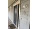 View of front door displaying unit number with adjacent wooden porch at 704 Martin Luther King Jr Blvd # D12, Chapel Hill, NC 27514