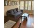 Well-lit living room with a comfortable couch and framed artwork on the wall at 704 Martin Luther King Jr Blvd # D12, Chapel Hill, NC 27514