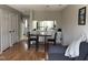 Open-concept living space with a dining area and kitchen in the background at 704 Martin Luther King Jr Blvd # D12, Chapel Hill, NC 27514