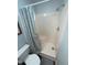 Clean shower stall with blue curtain in a bathroom, creating a functional space at 704 Martin Luther King Jr Blvd # D12, Chapel Hill, NC 27514