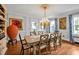 Elegant dining room with a chandelier, large table, and artistic accents at 712 Tarleton Ave, Burlington, NC 27215