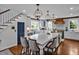 Bright, open kitchen featuring a large island with seating and modern pendant lighting at 712 Tarleton Ave, Burlington, NC 27215