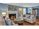 Inviting living room with a fireplace, plush seating, and stylish decor at 712 Tarleton Ave, Burlington, NC 27215