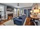 Inviting living room featuring a fireplace, hardwood floors, and stylish furnishings at 712 Tarleton Ave, Burlington, NC 27215