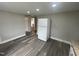 Kitchen area with luxury vinyl plank flooring and modern appliances at 804 S Sampson Ave, Dunn, NC 28334