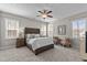 Serene bedroom with a plush bed, ample natural light, and neutral decor at 8816 Knights Union Way, Wake Forest, NC 27587