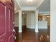 Welcoming foyer with hardwood floors, open to living spaces at 9221 Calabria Dr # 121, Raleigh, NC 27617