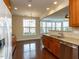 Bright kitchen eat-in area featuring stainless steel appliances and great natural light from multiple windows at 9221 Calabria Dr # 121, Raleigh, NC 27617