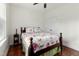 Comfortable bedroom with hardwood floors and closet at 100 Lexington Ave, Zebulon, NC 27597
