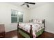 Bright bedroom with hardwood floors and natural light at 100 Lexington Ave, Zebulon, NC 27597