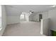 Spacious bonus room with neutral carpet and great natural light at 100 Lexington Ave, Zebulon, NC 27597