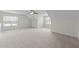 Large bonus room featuring neutral carpet and comfortable open space at 100 Lexington Ave, Zebulon, NC 27597
